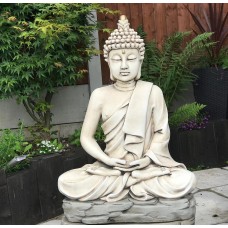 Praying Buddha on Rock Statue