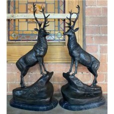 Pair of Bronze Highland Stags on Marble Bases - signed CURRENTLY OUT OF STOCK